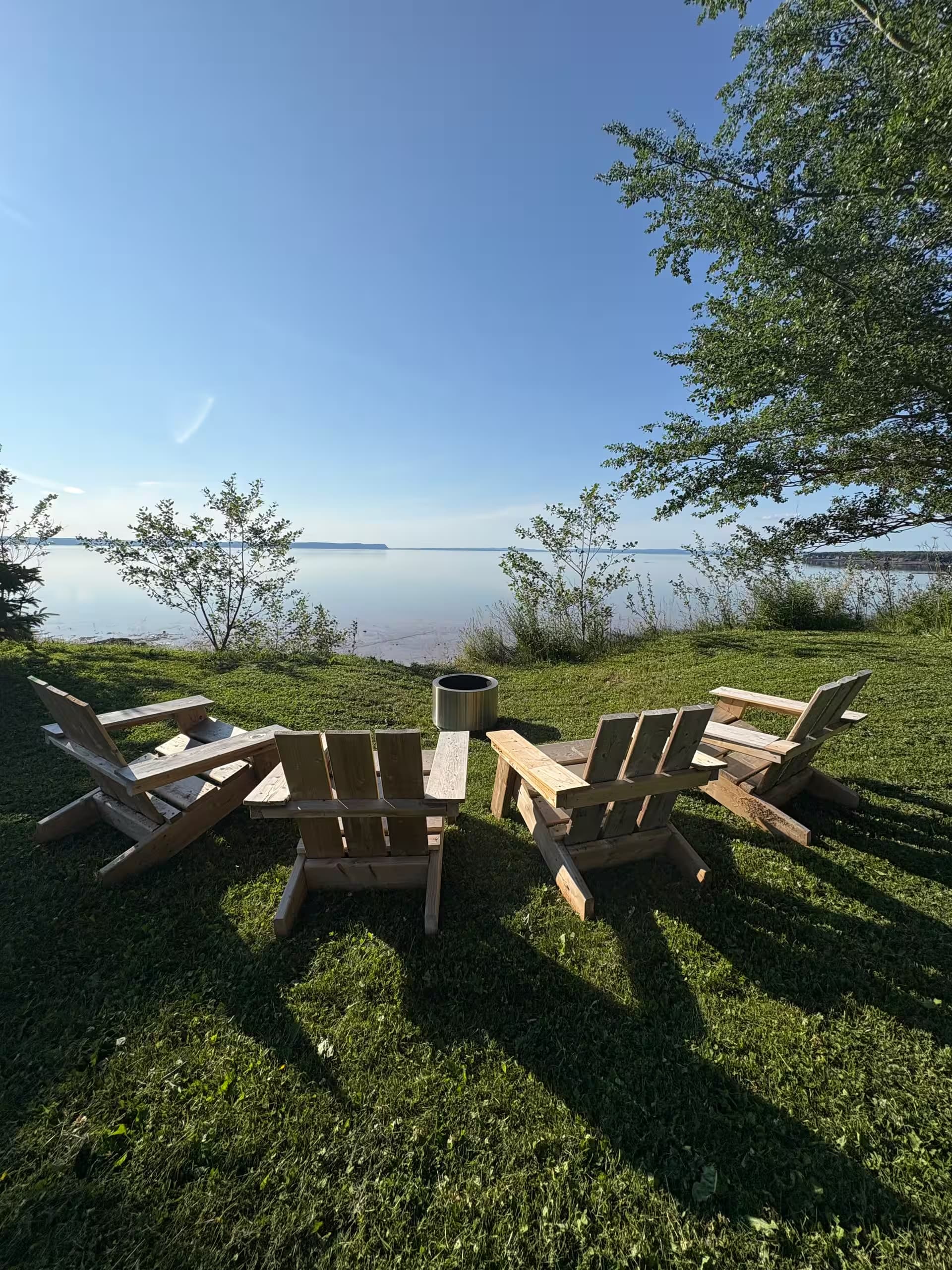 Adirondack chairs and fire pit overlooking the basin